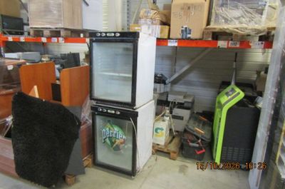 a refrigerator and a refrigerator freezer in a store