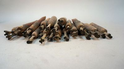 a lot of sticks that are sitting on a table
