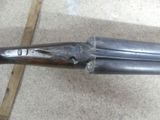 a gun that is laying on the ground