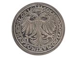 an image of a silver coin with an eagle on it