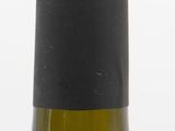 a bottle of wine that is sitting on a table