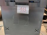 an image of a silver dishwasher sitting on top of a cardboard box