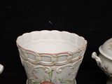 a bowl and a bowl with a lid on a table