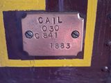 a close up of a train car with a sign on it
