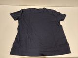 navy blue t - shirt on a white counter top