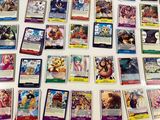a lot of pokemon trading cards on the table