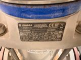 a close up of a blue and white motorbike