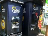 two vending machines that are on the side of the road