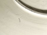 a close up of a white plate with a clock on it