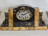 a clock that is sitting on top of a table