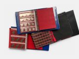 a lot of different types of binders on the table