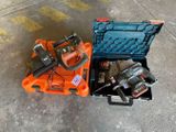 two tools in a case on the ground