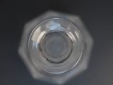 a close up view of a glass of water on a table