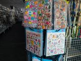 a display of stickers on a rack in a store