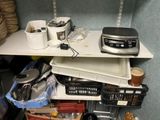 a shelf that has a lot of items on it