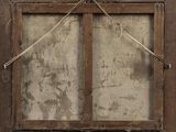 a picture of an old window with a rope hanging from it