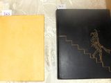 two books that are sitting on a table