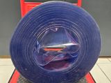 a roll of blue tape sitting on top of a red cart