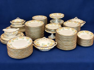 an image of a bunch of plates and bowls sitting on a table
