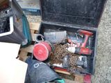 a tool box with chains and other tools in it
