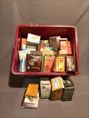 a red box filled with various types of teas