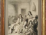 an old picture of a woman sitting in a room with other people