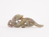 figurine of a cat and a dog on a white background