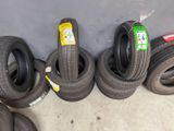 several tires are lined up in a row on the floor