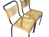 pair of vintage rattan chairs in the style of giano