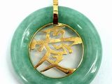 gold plated pendant with a green jade ring with a horse in the center