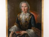 portrait of a woman in a blue dress holding a fan