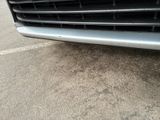 a close up view of a car ' s grille and front bumper