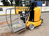 a forklift that is sitting in the dirt