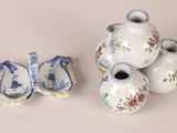 three vases that are sitting next to each other on a table