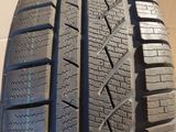 a close up of a tire on a cardboard box
