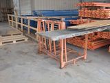 a large pile of wood sitting in a warehouse