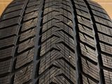 a close up of a tire on a wooden surface