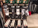 a display of socks and socks for sale in a store
