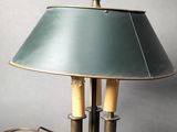 a lamp that is sitting on a table with a lamp on it