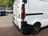 a white van that is parked in a parking lot
