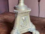 a lamp that is on top of a wooden table