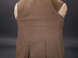 an image of the back of a brown vest on a mannequin mannequin mannequin mannequin mannequin mannequin mannequin