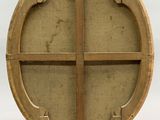 an image of a wooden circular shelf with four sections