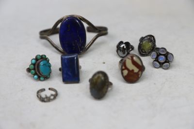several different rings and rings are sitting on a table