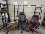 two chairs that are next to each other in a room