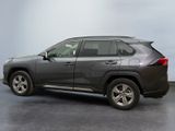 2020 toyota rav in a room with a blue wall