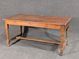 a small table with a wooden top on a gray background