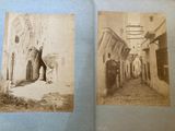 two old black and white photos of a man and a woman standing in an alley