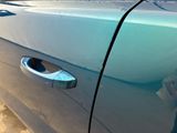 a close up of a car door handle with the door handle open