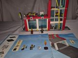 a picture of a lego fire station with a fire hydrant and a fire hydrant